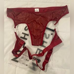 2 items in bundle. Ordered two by accident. NWOT RED LINGERIE